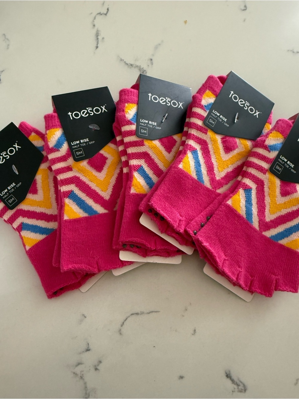 toesox Low Rise Chevron Toe Socks in Pink, Yellow, Blue & White